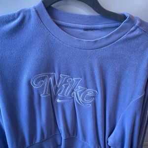 Its purple! But looks blue in the picture